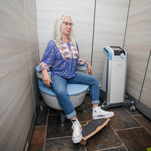 Patient using the Emsella chair to correct bladder leakage.